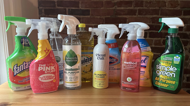 All-purpose kitchen cleaner bottles arranged on wooden table