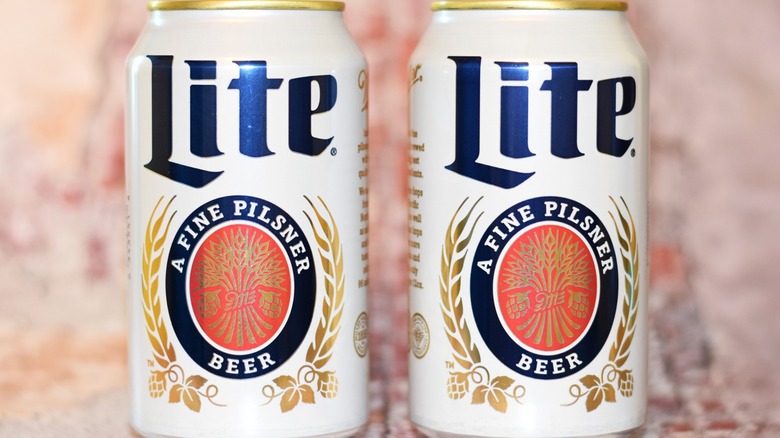 Two cans of Miller Lite pictured up close
