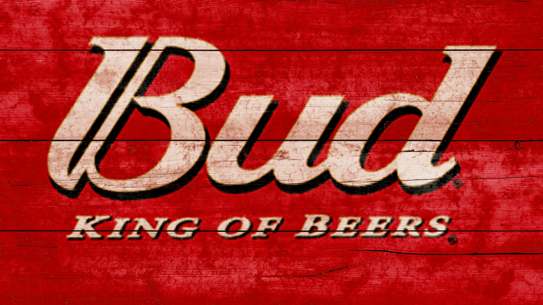 A red sign reading "Bud King of Beers"