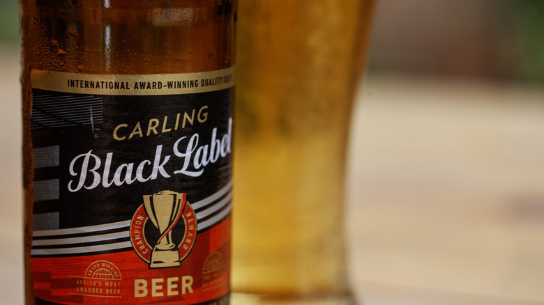 A bottle and glass of Carling Black Label Beer