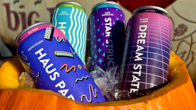 Four cans of Big Rock beers in a pumpkin