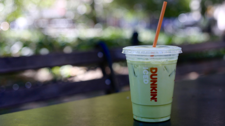 Dunkin' Matcha Latte in a to-go cup