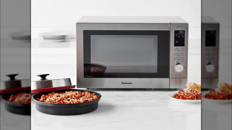 Panasonic 4-in-1 microwave oven on a kitchen countertop.