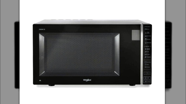 Whirlpool Magicook Pro microwave oven on a white background.