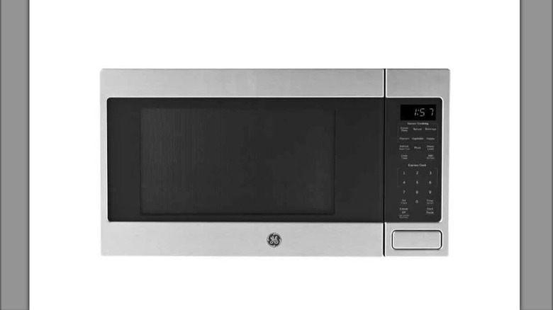 GE sensor microwave on a white background.