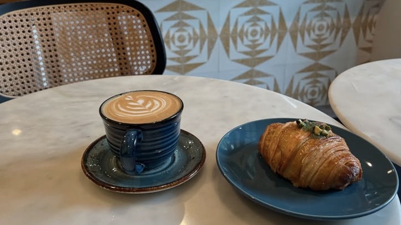 Delicious pastry and coffee on a table at Badolina Bakery in Houston Texas