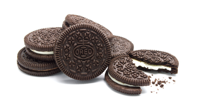 A pile of Oreos against white background