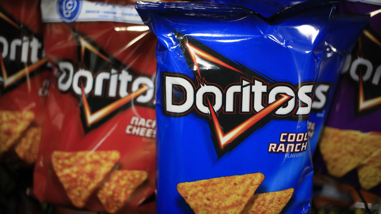 Bag of Doritos Cool Ranch with other flavors in background