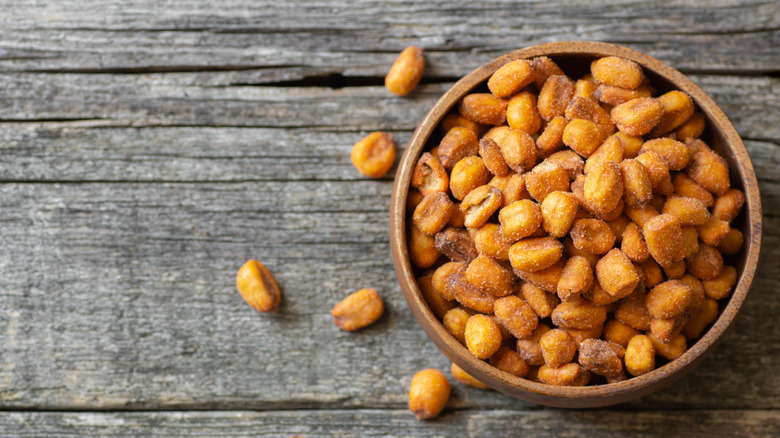 Bowl of Corn Nuts on a wooden table