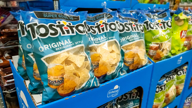 Bags of Tostitos at grocery store