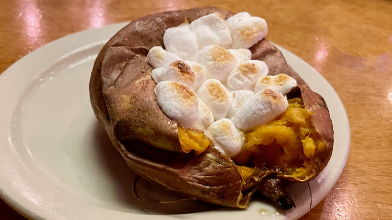 Loaded sweet potato with caramel and marshmallows