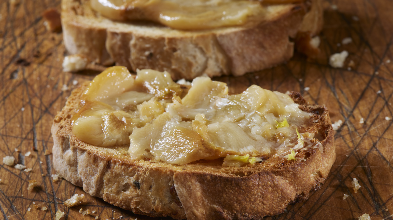 Grab Olive Oil To Transform Pre-Peeled Garlic Into Rich, Spreadable Confit - Tasting Table