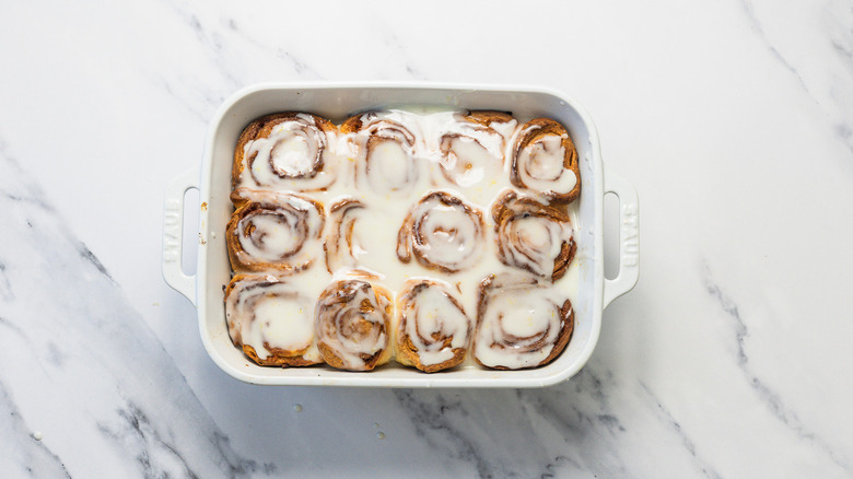 Preserved lemon cinnamon buns with white icing.