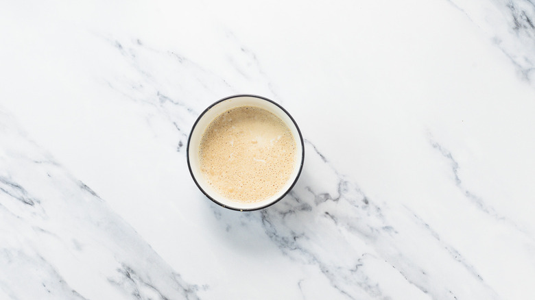Bowl with active yeast mixture.