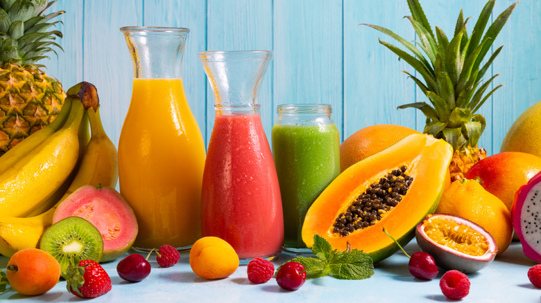 assortment of tropical fruits and juices