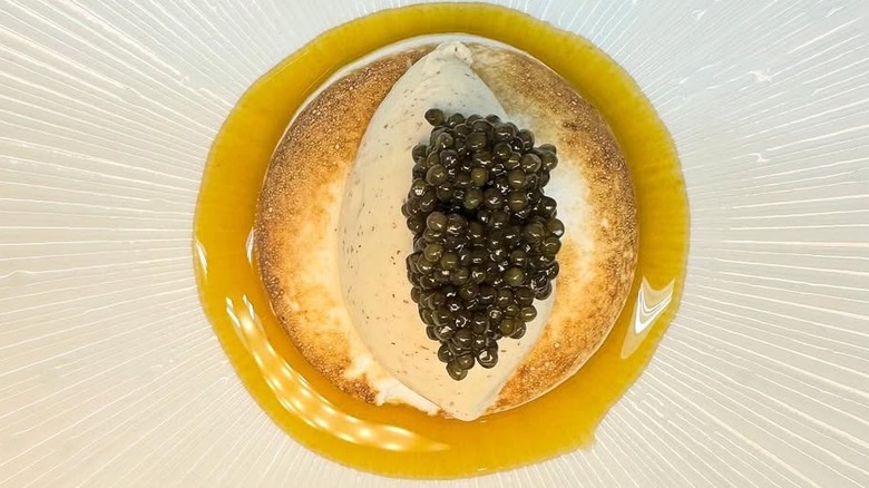 Pink peppercorn sorbet topped with caviar at Stages at One Washington