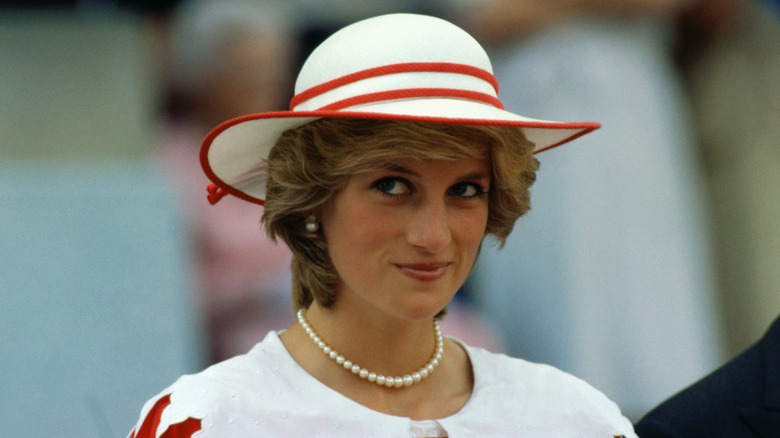 Princess Diana wearing hat, smiling