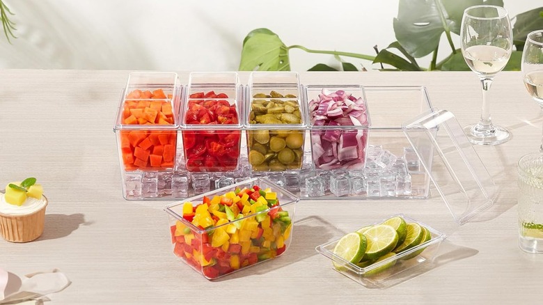A Lifewit taco bar serving set with fillings on a table