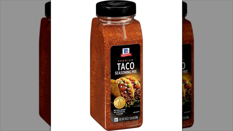 A bottle of McCormick premium taco seasoning mix
