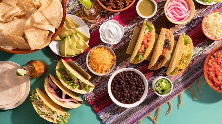Tacos and fixings on a table
