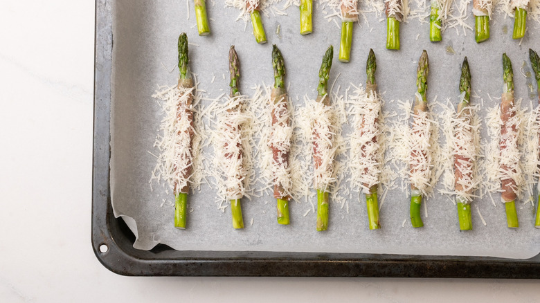 Parmesan sprinkled prosciutto-wrapped asparagus