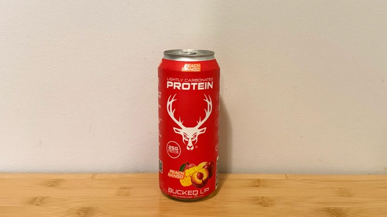 Bucked Up Peach Mango protein soda on display