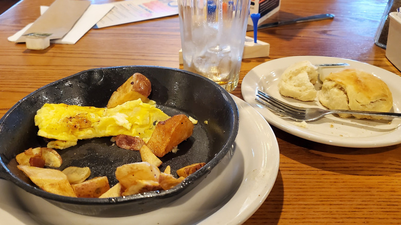 Half-empty skillet with eggs and homestyle potatoes from Cracker Barrel