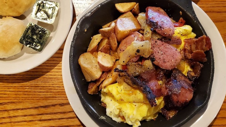 Cracker Barrel Campfire Breakfast Skillet next to biscuits and butter