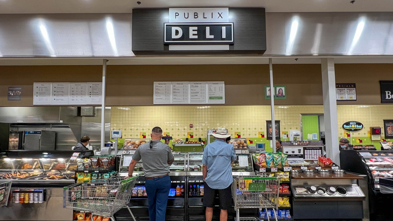 people waiting for sandwiches from Publix deli