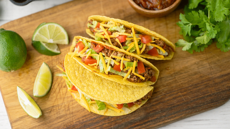beef tacos on a wooden board