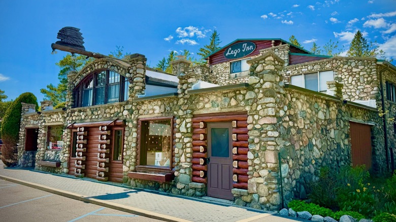 Exterior of Legs Inn, a stone building on a sunny day