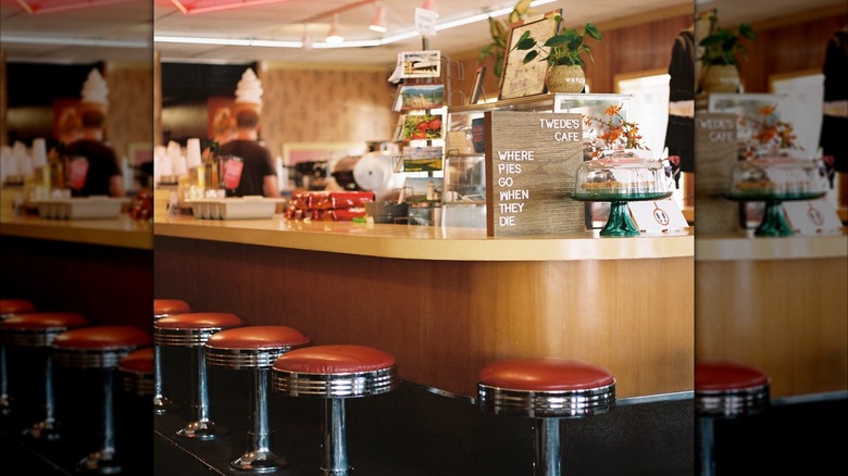 Retro diner counter with red stools