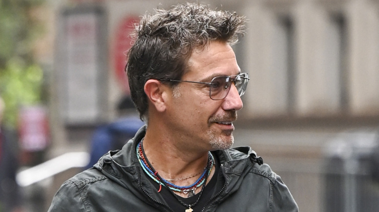 Gino D'Acampo wearing sunglasses and casual clothes