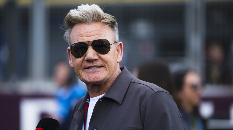 Gordon Ramsay with tinted RayBan sunglasses.