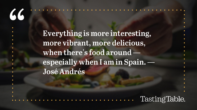Quote by José Andrés with a chef arranging food in the dimmed background.