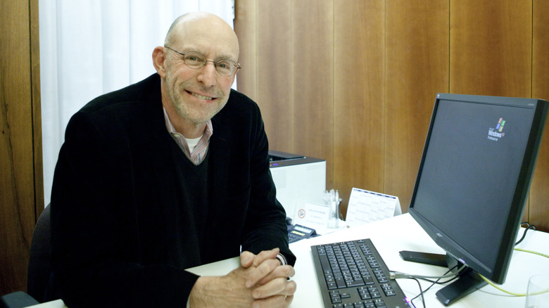 American author and journalist Michael Pollan sitting in an office