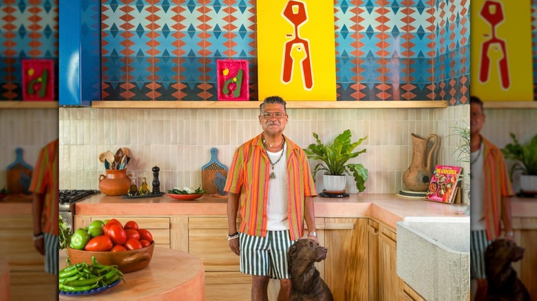 Martínez and his dog Choco in his home in Mexico