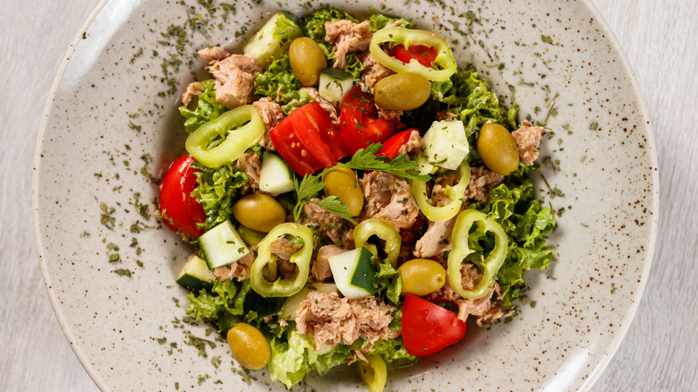 Mediterranean tuna salad with olives, peppers, tomatoes and feta