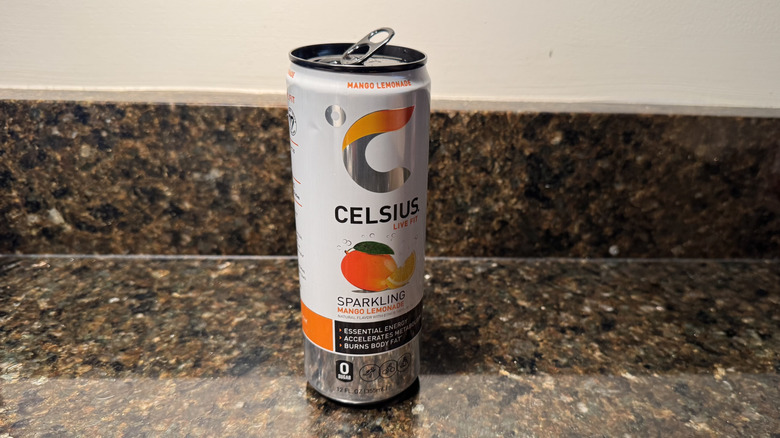Can of Celsius Sparkling Mango Lemonade on countertop