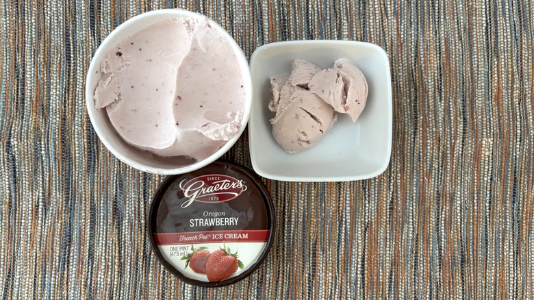 Pint of strawberry ice cream with bowl