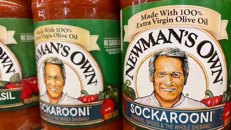 A close up of jars of Newman's Own Sockarooni sauce at a store
