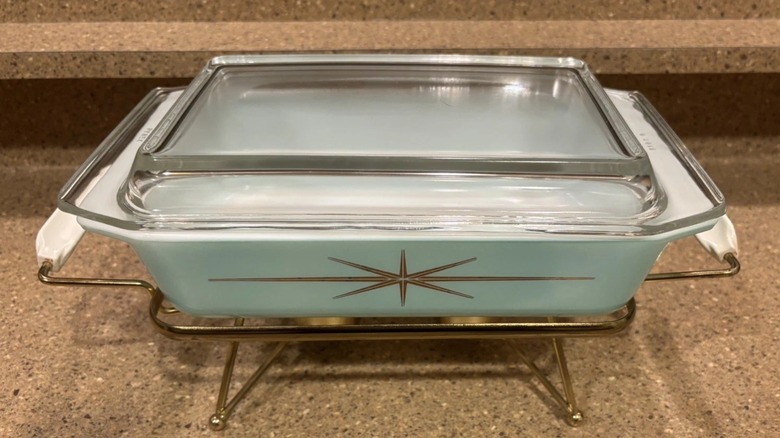 A pale turquoise Starburst Cinderella Casserole dish made by Pyrex