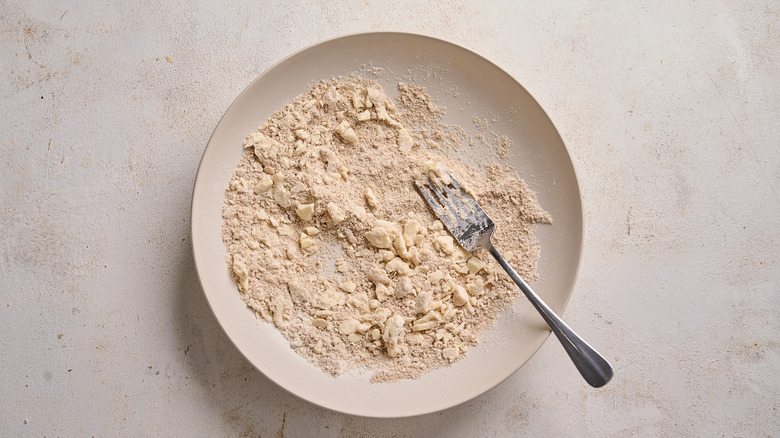 mixing streusel together in a bowl