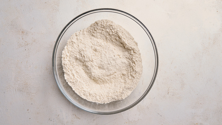 combining dry ingredients in a bowl