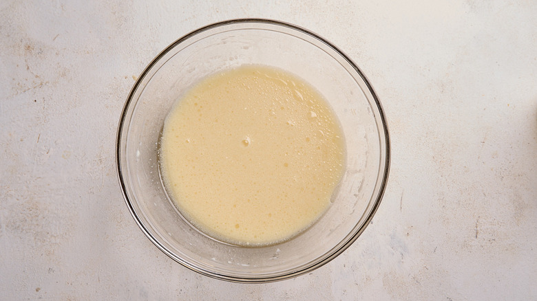 combining wet ingredients in a bowl