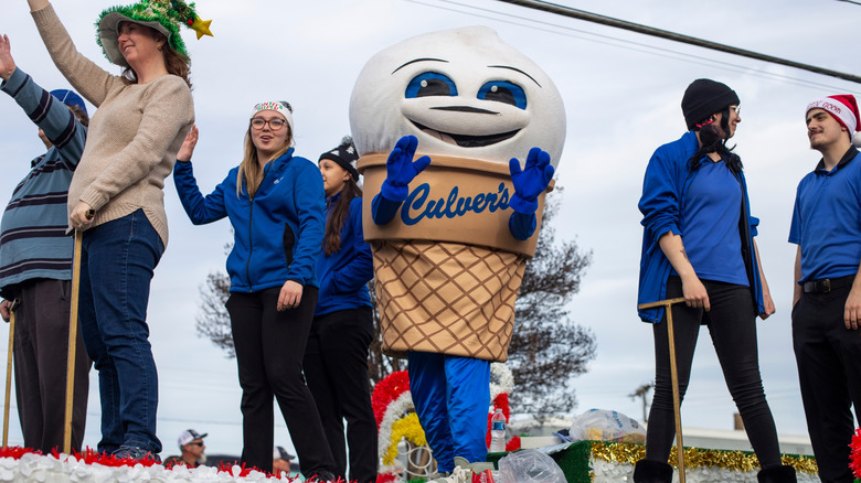 Culver's staff and mascot on a parade float