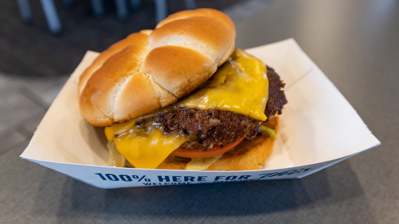A Culver's ButterBurger sitting in a paper tray