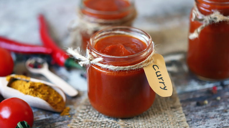 a jar of sauce labeled "curry"
