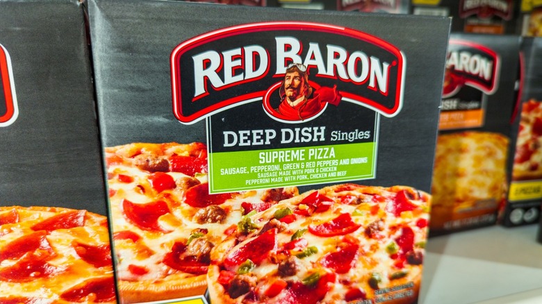 Red Baron Supreme Pizza on a grocery store frozen food shelf