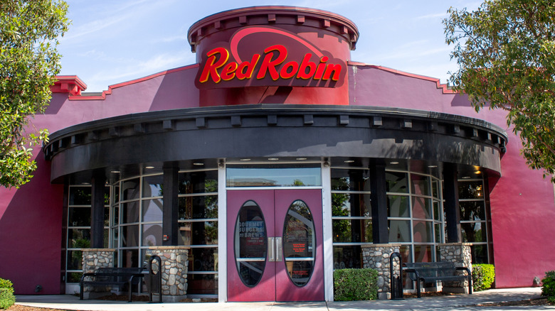 Red building with large sign spelling "Red Robin" above the entrance.